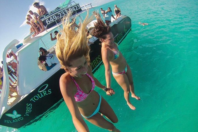 4hour Group Half Day Snorkeling Excursion in Grace Bay - The rooftop jump board and curved slides