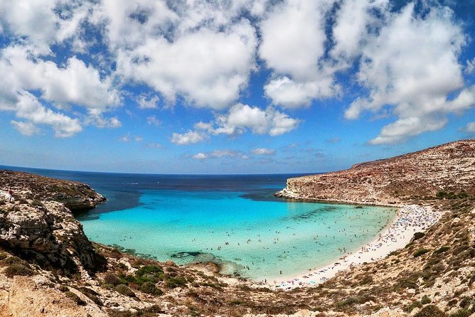 7 hours Boat trip to Lampedusa lunch, SUP and Snorkeling - Dolphins, turtles, and the pleasure of not knowing