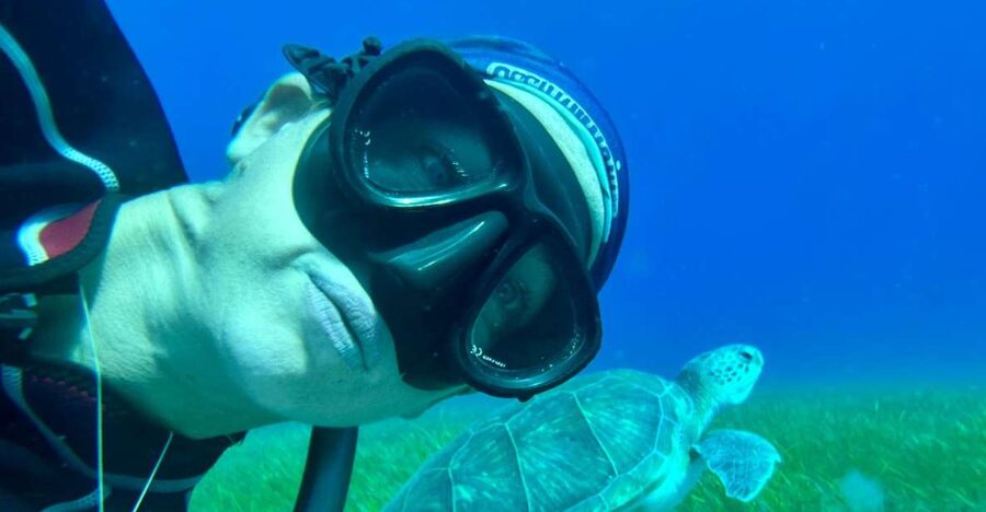 Abades: Guided Snorkeling Tour with Photos - Getting fitted with wetsuits, masks, and fins
