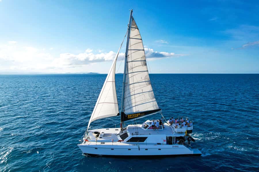Airlie Beach: Whitsunday Islands Sailing, SUP & Snorkel Tour - Boarding Wings III at Coral Sea Marina