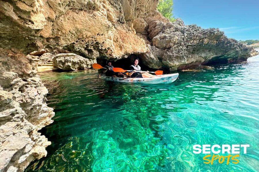 Alcudia: Kayak Tour with Snorkel & Sea Cave Swim - Sea caves, rock walls, and the best photo moments