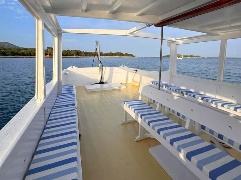 Alcudia Mallorca: Boat Trip with Food, Snorkeling, and SUP - Mallorcan tapas, sangria, and the onboard bar