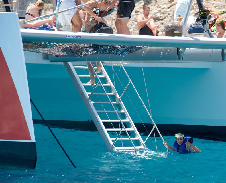 Alcudia: Sunset Catamaran Tour with Dinner and Snorkeling - Music, dancing, and the social side