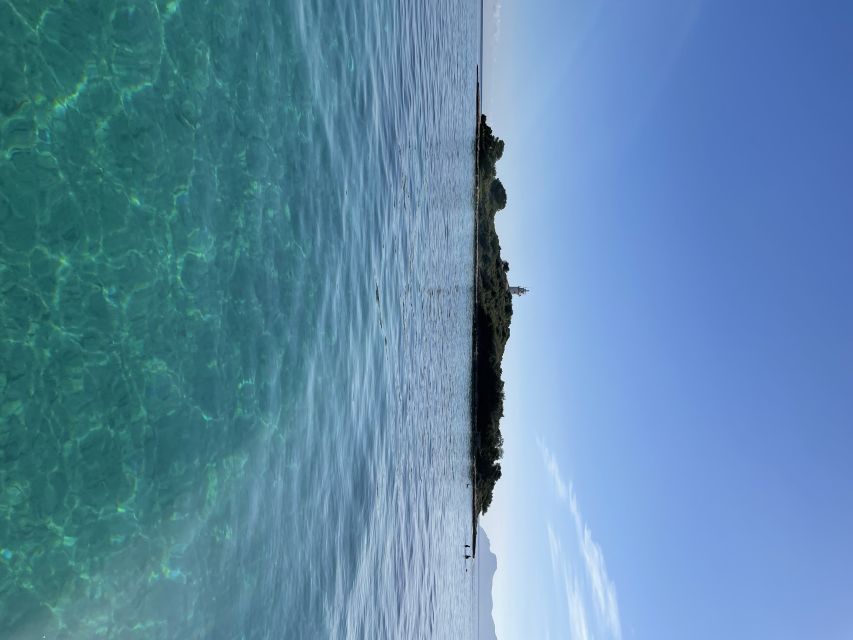 Alcudia: Traditional Wooden Boat Trip with Snorkeling - A Mallorcan snack with a view
