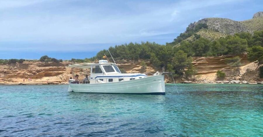 Alcudia: Traditional Wooden Boat Trip with Snorkeling - Sailing past Aucanada and Cap Menorca