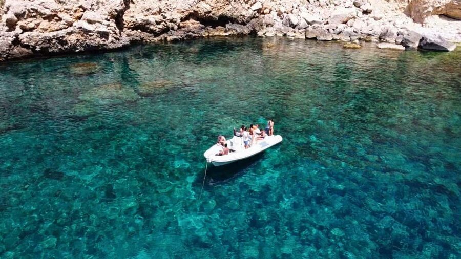 Alghero: Snorkeling Boat Tour in Porto Conte and Capo Caccia - Carlo’s guiding style and the human side of the trip