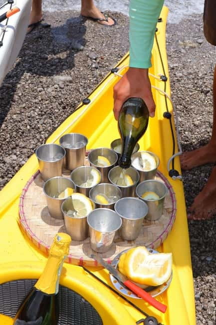 Amalfi: Kayak-Snorkel to Pandora Cave, Hidden Beach & Drinks - Paddling past San Nicola and the Norman Tower