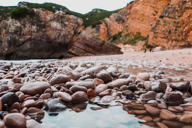 Arrábida Secret Beaches and Caves with Snorkeling Stop - The boat matters more than the photos suggest