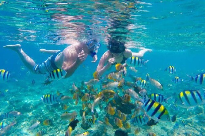 Bali Blue Lagoon Snorkeling with Private Transfer & Lunch - Boarding the traditional boat