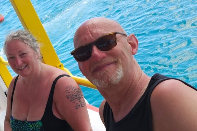 Barbados Glass Bottom Boat Cruise and Snorkeling - Boarding from the beach
