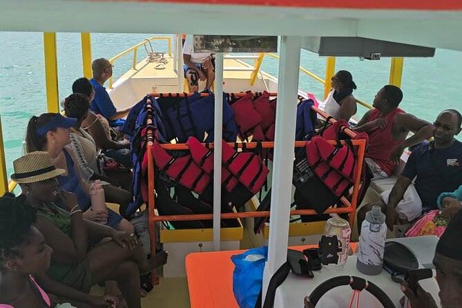 Barbados Glass Bottom Boat Cruise and Snorkeling - Crew members who shape the experience