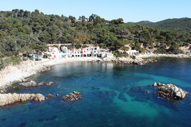 Barcelona Adventure: Costa Brava Hike & Snorkel - Snorkeling in clear Mediterranean water