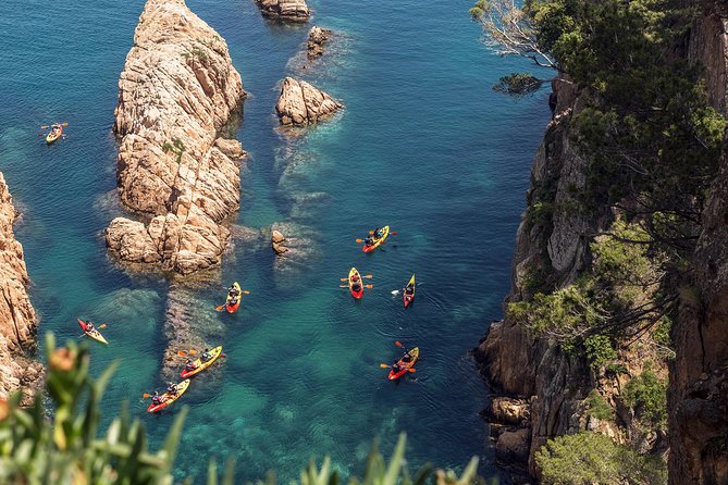 Barcelona Costa Brava Kayak, Snorkel & Cliff Jump Day Tour - Collecting gear at San Pol Beach