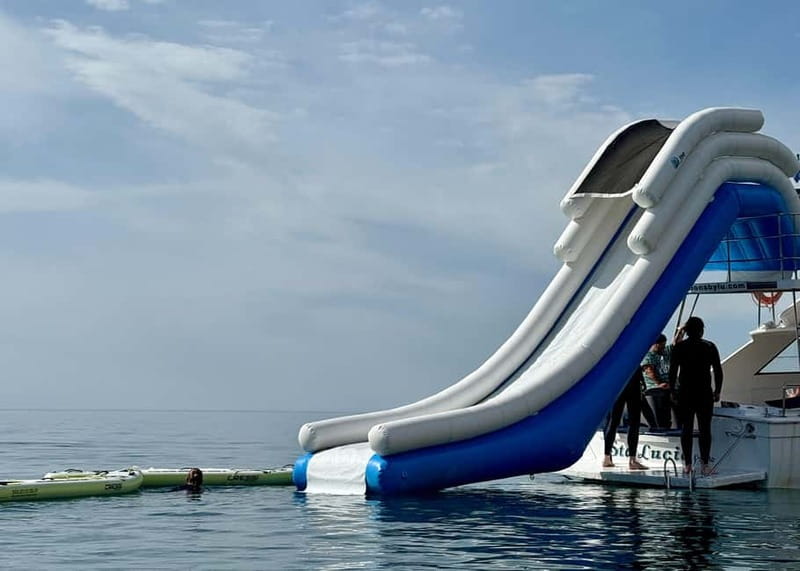 Benalmádena Boat Tour with Snorkeling, Water Slide and Lunch - Who will enjoy this most