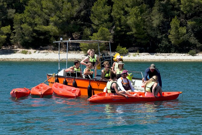 BOAT & KAYAK! Sea Adventure - Snorkeling & Cliff Jumps - Hidden beach stop: swimming, fish, and sea urchins