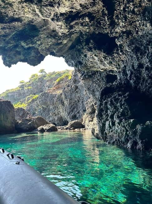 Boat Tour: Island hopping by dinghy with cave visits and snorkeling - Caves, coves, and the view from sea level