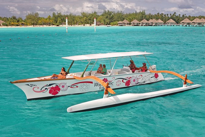 Bora Bora Snorkel Cruise by Polynesian Outrigger Canoe with BBQ Island Lunch - Cruising Bora Bora’s lagoon in an outrigger canoe