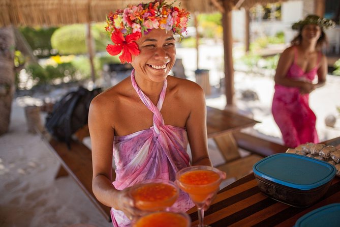 Bora Bora Snorkel Cruise by Polynesian Outrigger Canoe with BBQ Island Lunch - Music and guides shape the day