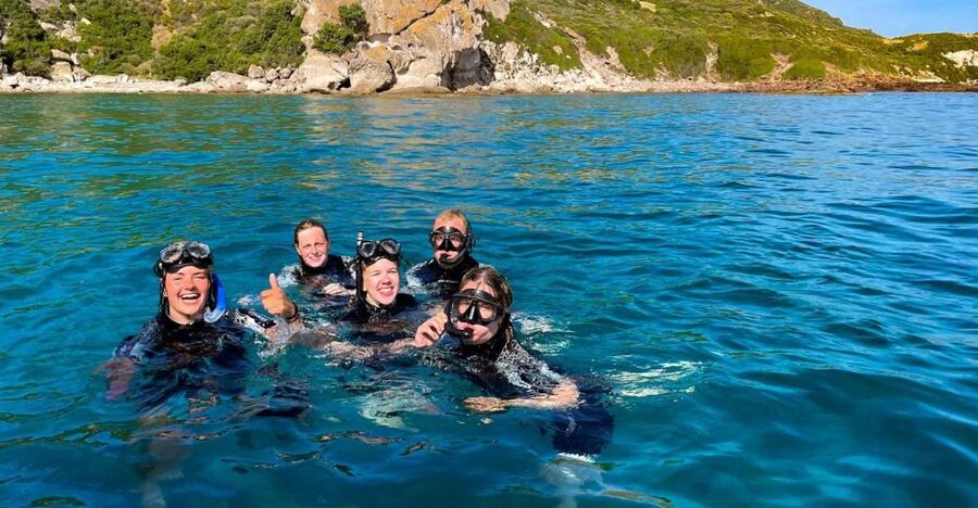 Bosa: Snorkeling Tour of the Coastline Coves - Leaving Bosa in an eight-metre dinghy