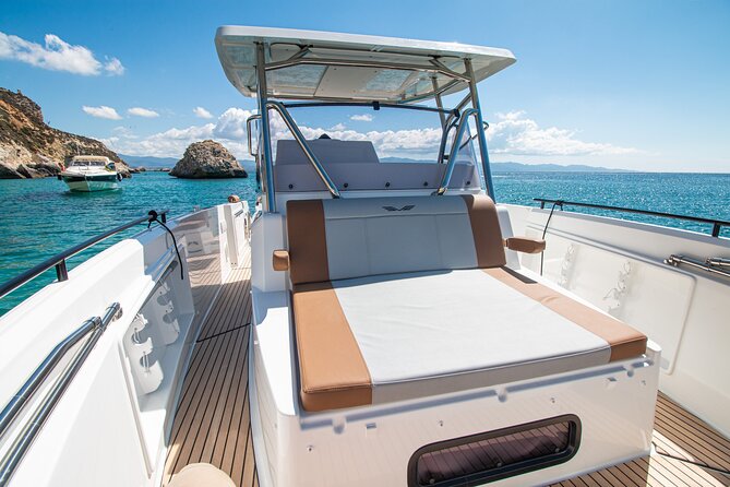 Cagliari 3 Hours Luxury Motorboat Tour - Wine and Snorkeling - Snorkeling around the rocky coves