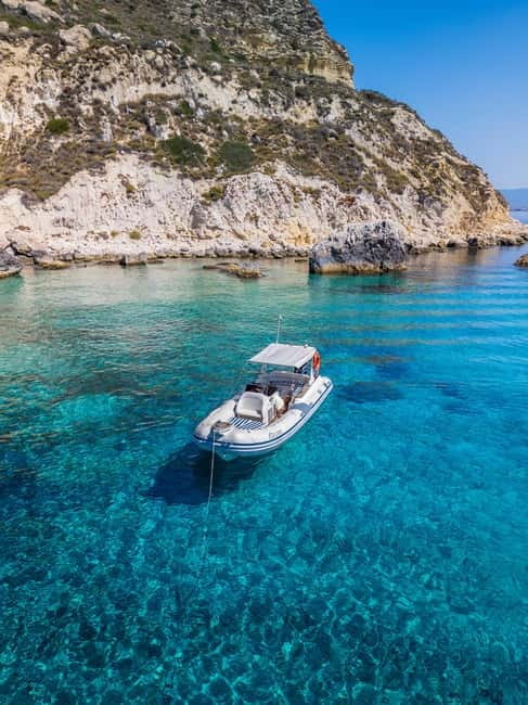 Cagliari: Boat Tour, Snorkeling, Prosecco & Music! - Cala Bernat: your first look at the Gulf
