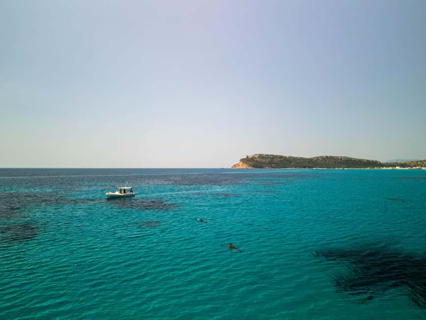 Cagliari: Boat Tour, Snorkeling, Prosecco & Music! - The fourth stop near Sella del Diavolo