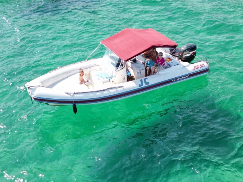 Cagliari: Boat Tour snorkeling Sella con con aperitivo - Cala Mosca, the first half-hour in the water