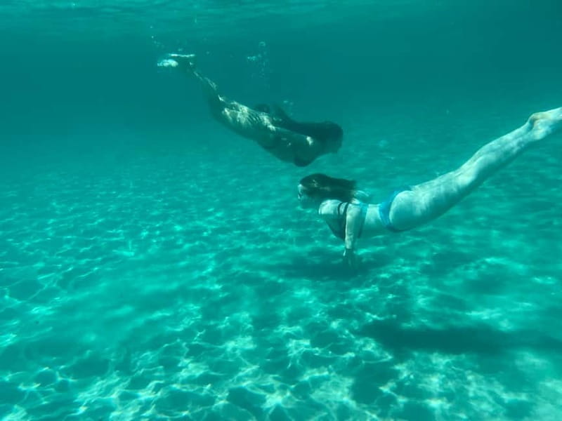 Cagliari: Boat Tour with 4 Swim Stops, Snorkeling & Prosecco - Snorkeling gear, swimming time, and Prosecco
