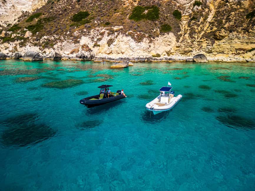 Cagliari: Boat Tour with 5 Snorkeling Stops & Free Drinks - Cala Mosca and the first swim