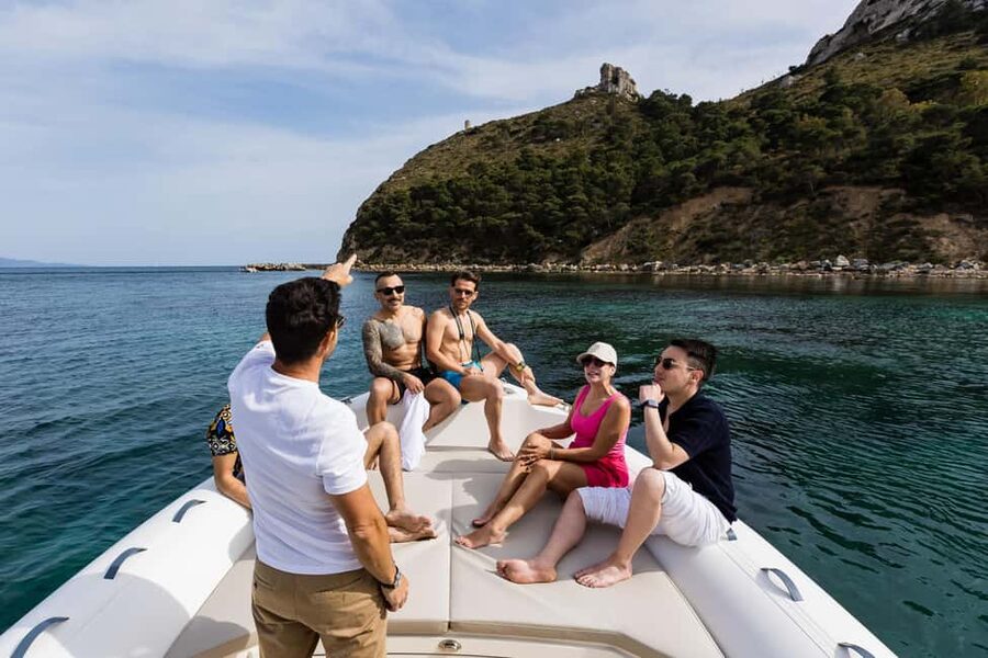 Cagliari: Boat Tour with 5 Snorkeling Stops & Free Drinks - Sella del Diavolo from the water