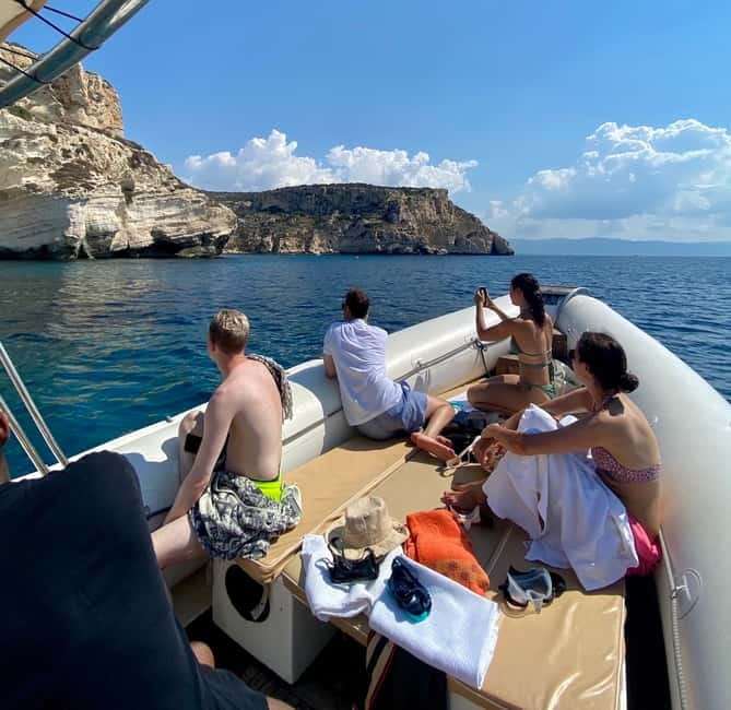 Cagliari: Boat Tour with Snorkeling, GoPro & Sardinian Beer - Leaving Cagliari Port by speedboat