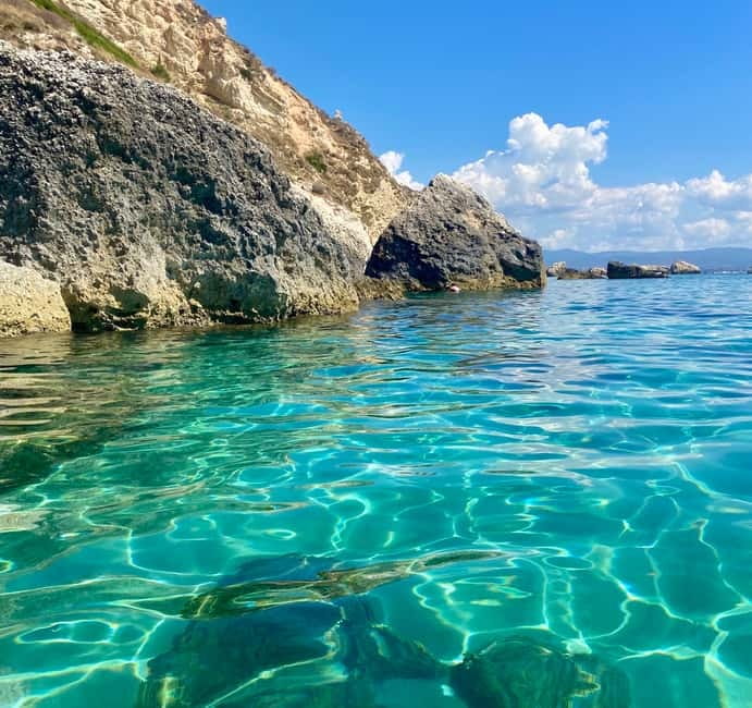Cagliari: Boat Tour with Snorkeling, GoPro & Sardinian Beer - The Devil’s Saddle from the water