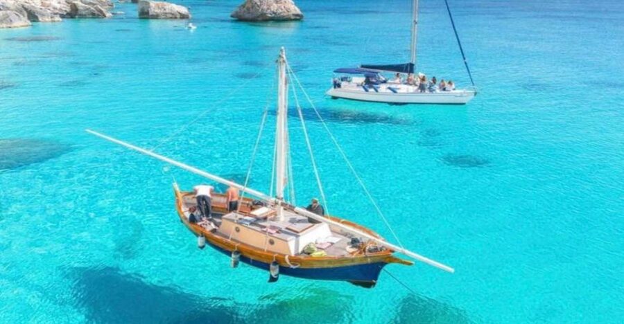 Cagliari: Boat Tour with Swim Stops, Snorkeling, & Aperitif - Five coves around the Devil’s Saddle