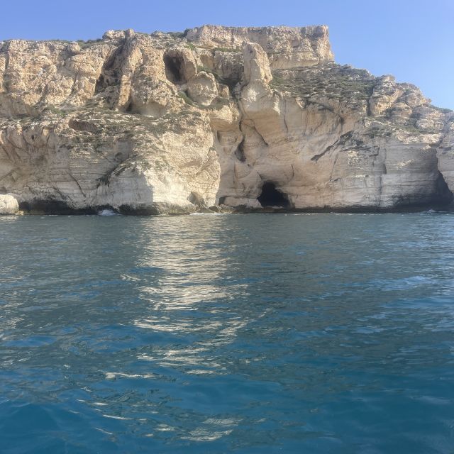 Cagliari: Boat Tour with Swim Stops, Snorkeling, & Aperitif - Poetto closes the route with a broad beach view