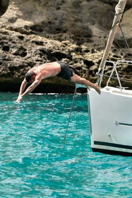 Cagliari: Catamaran Tour, Swimming, Snorkeling, & Prosecco - Sea conditions, seasickness, and practical comfort
