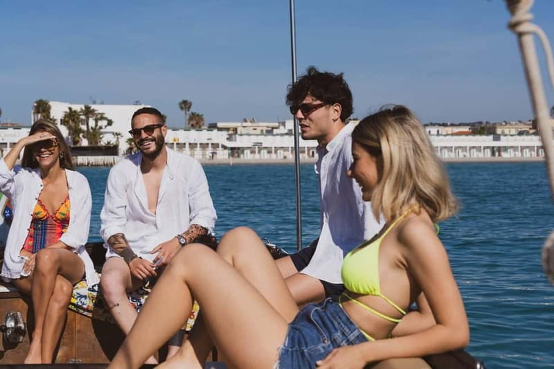 Cagliari: Gozzo Tour with 3 Swim Stops, Snorkel & Local Food - What the $51 price really covers