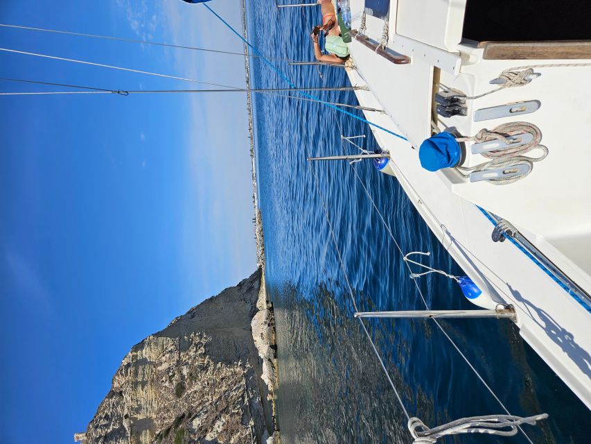 Cagliari Sailing Boat Tour with Snorkeling and Drink - Swimming in the natural pools of Sella del Diavolo