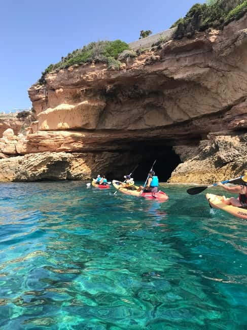 Cala Codolar: Sea & Caves Kayaking Tour with Snorkeling - Cliffs, caves, and quiet coves