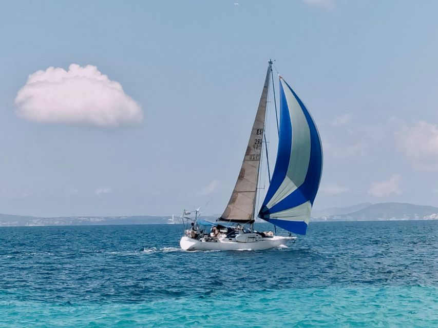 Can Pastilla: Sailboat Tour with Snorkeling, Tapas & Drinks - First stop near Cap Enderrocat