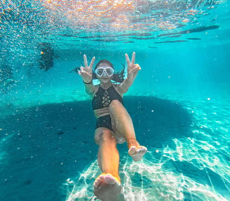 Can Picafort: 2-Hour Boat Tour with Snorkeling & Sea Caves - The run toward Coll Baix
