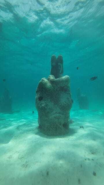 Cancun: Snorkeling Boat Tour with Gear - The shipwreck feels like a natural turquoise pool