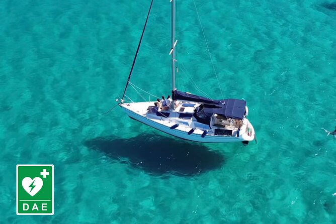 Catamaran tour stops bathing and snorkeling toast with prosecco - Sailing out from Cagliari’s port