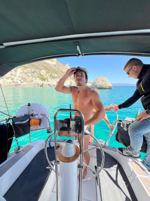 Catamaran tour, swimming, snorkeling, and a Prosecco toast - Setting off from Portus Karalis in central Cagliari