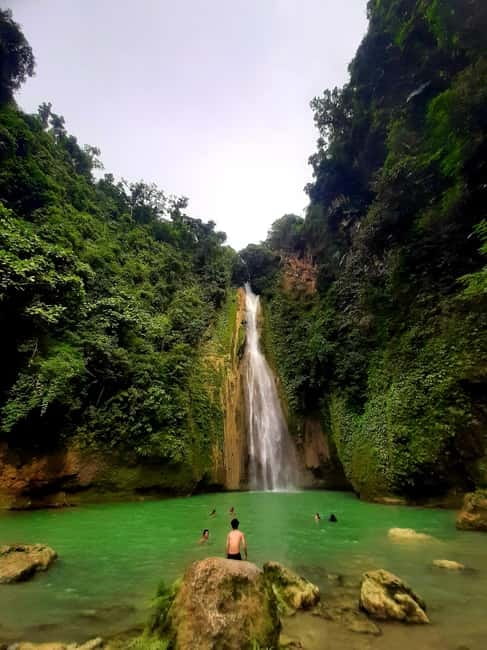 Cebu: Moalboal Snorkeling, Mantayupan Falls & ATV Adventure - Moalboal’s sardine run at Panagsama Beach