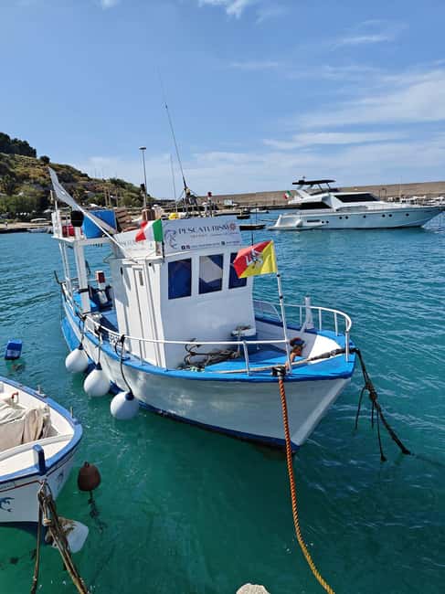 Cefalù: boat trip with fishing, coastal tour, snorkeling, and lunch on board - Watching the nets come aboard