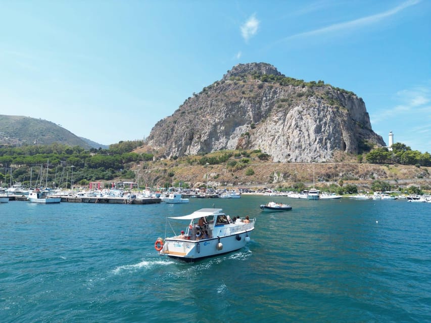 Cefalù: Mini Yacht with Snorkel Stops, Caves and Aperitif - Cefalù’s churches and fishing village from offshore