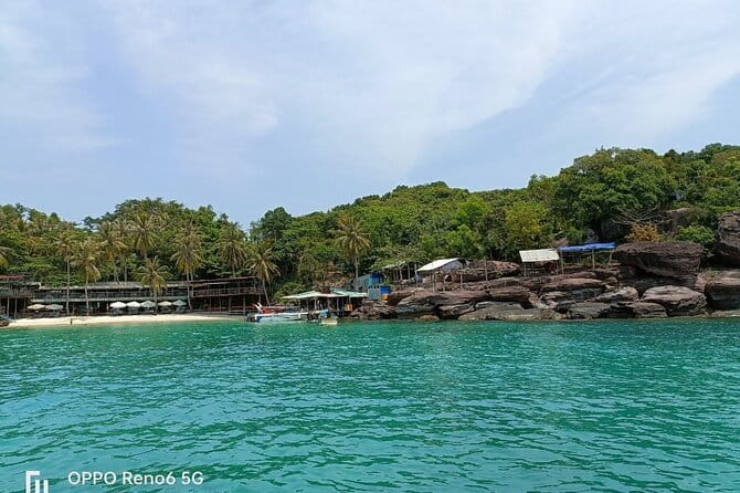 Cham Island: Snorkeling Tour - Riding a Traditional Vietnamese Wooden Boat