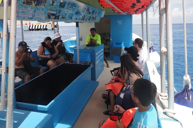 Cozumel Coral Reef Snorkeling by Glass Bottom Boat with Guide - Equipment, drinks, and the practical extras
