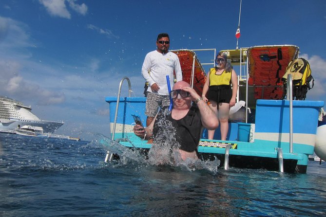 Cozumel Coral Reef Snorkeling by Glass Bottom Boat with Guide - Boarding the small glass-bottom boat