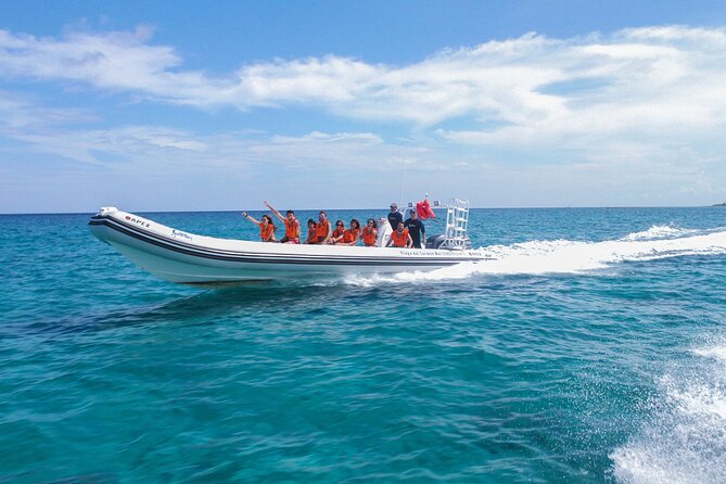Cozumel Starfish and Tropical Reef Snorkeling by Powerboat with Lunch - A guide who stays involved in the water